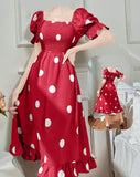 Dress made of dotted cotton with elastic at the chest