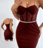 Lycra dress with metal chains around the shoulders and waist