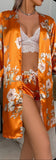 3-piece pajamas consisting of a lace top, shorts and a robe made of floral satin