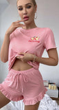 Two-piece cotton pajama with ruffles from the tail of the shorts