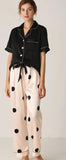 Two-piece pajama made of satin with dotted pants