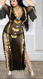 A belly dance abaya made of tulle, open on the sides, with embroidery of shiny metal rings