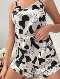 Pajama made of satin with cow print