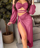 Two-piece dress made of lycra, open from one side, off shoulder