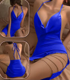 Lingerie made of satin with metal chains on one side and an open back