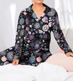 Two-piece pajamas made of satin with different graphic prints