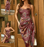 Dress made of floral satin, open on one side