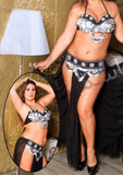A belly dancing suit made of chiffon with embroidery of shiny metal rings