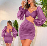 Dress made of butter Lycra with chiffon sleeves, open on one side and back
