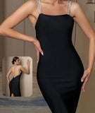Dress made of Lycra with shiny shoulder straps and open back