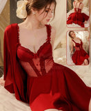 Two-piece lingerie made of satin and chiffon at the stomach and ruffles at the shoulders