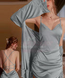 Two-piece lingerie made of satin, ruffled on the sides, open back, and lace at the chest and sleeves