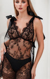 Two-piece lingerie made of lace with a satin strap at the shoulder