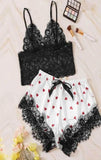 Two-piece pajamas made of lace and satin with hearts printed on the shorts