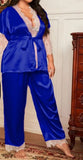 Two-piece pajamas made of satin with lace on the sleeves at the chest and the end of the trousers