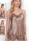 Two-piece pajama made of satin with lace at the chest and the end of the shorts