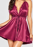 Lingerie made of satin with elastic in the middle and ruffles around the chest