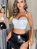 Two-piece lingerie made of shiny leather with metal chains on one side and at the shoulders