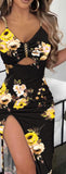 Dress made of floral Lycra, open on one side with metal shoulder straps