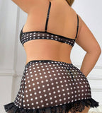Lingerie made of dotted chiffon with lace at the chest and tail and open at the back