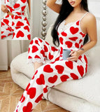 Two-piece pajamas made of cotton with a heart print and lace around the chest