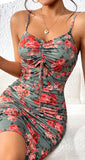 Dress made of floral Lycra with a ruffle tie at the chest