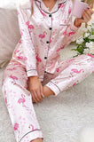 Two-piece pajamas made of satin with flamingo print