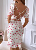 House dress made of floral cotton with an open back