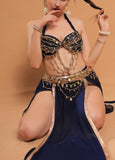 A belly dancing suit made of chiffon with embroidery and shiny metal rings