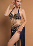 A belly dancing suit made of chiffon with embroidery and shiny metal rings