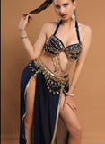 A belly dancing suit made of chiffon with embroidery and shiny metal rings