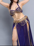 A belly dancing suit made of chiffon with embroidery and shiny metal rings