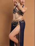 A belly dancing suit made of chiffon with embroidery and shiny metal rings