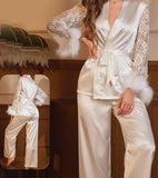 Two-piece pajama made of satin with lace sleeves