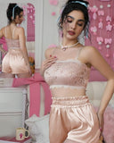 Two-piece pajamas made of satin and lace