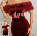 Dress made of velvet with chiffon at the belly and ruffles at the shoulders