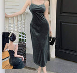 Long dress made of velvet, open on one side