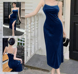 Long dress made of velvet, open on one side