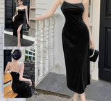 Long dress made of velvet, open on one side