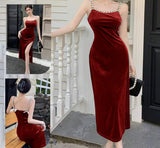 Long dress made of velvet, open on one side