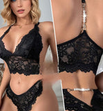 Two-piece lingerie made of lace with metal chains at the back