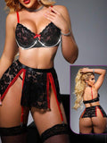 3-piece lingerie made of lace with shiny chains at the chest