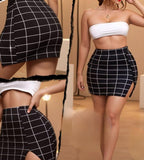 Two-piece lingerie made of lycra with a checkered skirt.