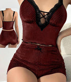 Two-piece pajama set made of velvet  with lace at the chest.