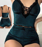 Two-piece pajama set made of velvet  with lace at the chest.