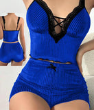 Two-piece pajama set made of velvet  with lace at the chest.