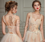 Two-piece lingerie made of tulle with ties on the sides