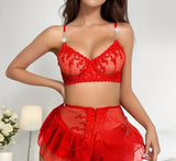 Two-piece lingerie made of tulle and lace with ruffles at the tail