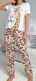 Two-piece pajamas - Butter Lycra - with a giraffe face print on the T-shirt and dotted pants