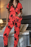 Two-piece pajama - made of floral satin - with lace around the neck, sleeves, and the end of the pants - Dala3ny